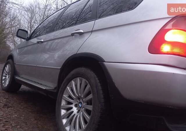 Сірий БМВ Х5, об'ємом двигуна 2.93 л та пробігом 380 тис. км за 8100 $, фото 4 на Automoto.ua
