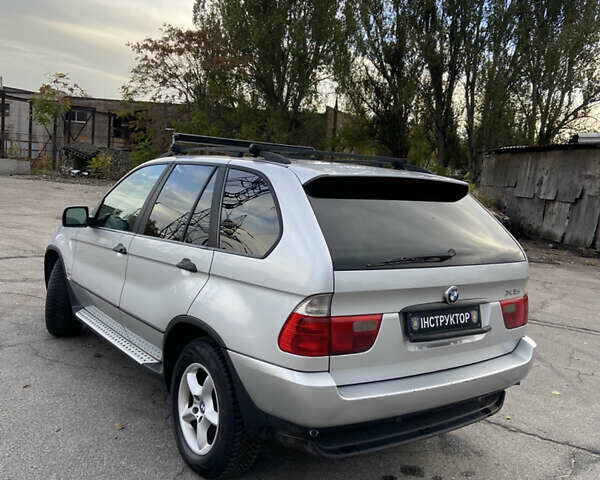Серый БМВ Х5, объемом двигателя 3 л и пробегом 390 тыс. км за 5500 $, фото 4 на Automoto.ua