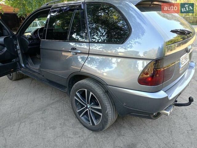 Сірий БМВ Х5, об'ємом двигуна 3 л та пробігом 400 тис. км за 11000 $, фото 4 на Automoto.ua