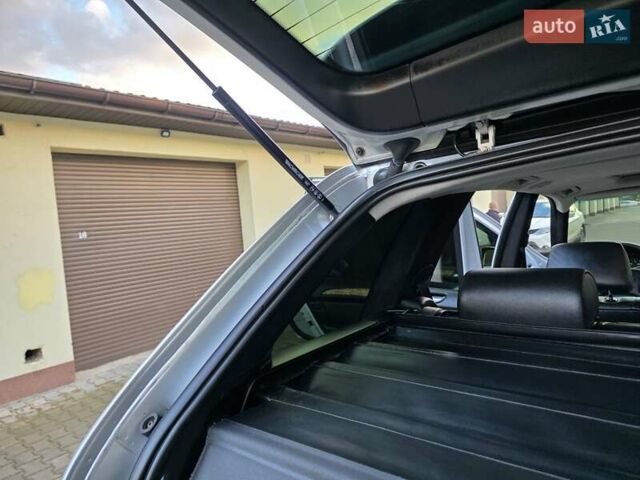 Серый БМВ Х5, объемом двигателя 3 л и пробегом 295 тыс. км за 7999 $, фото 121 на Automoto.ua