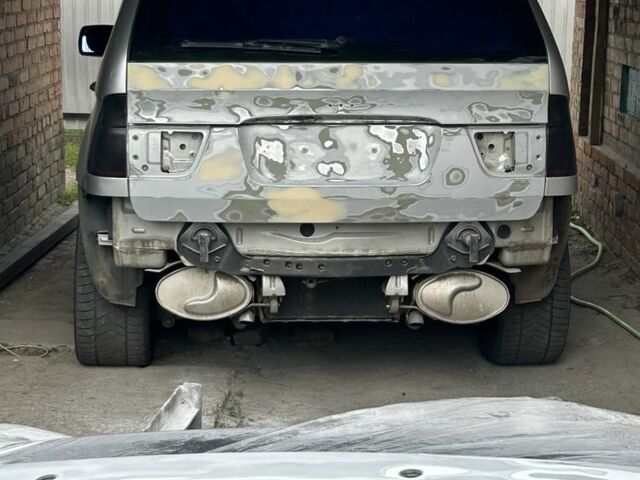 Серый БМВ Х5, объемом двигателя 3 л и пробегом 305 тыс. км за 3499 $, фото 7 на Automoto.ua