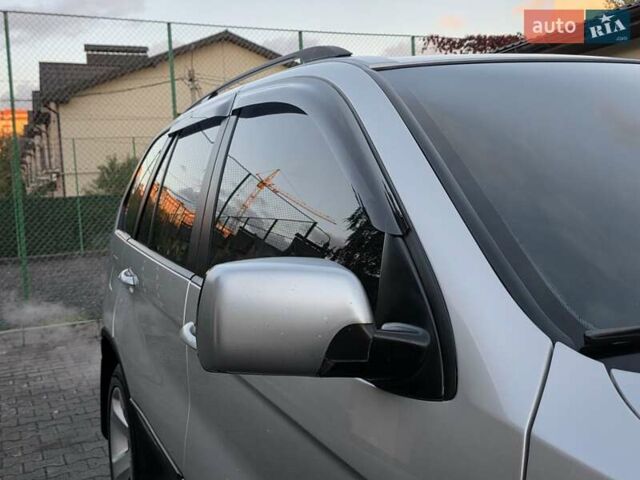 Серый БМВ Х5, объемом двигателя 3 л и пробегом 295 тыс. км за 7999 $, фото 48 на Automoto.ua