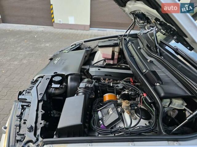 Серый БМВ Х5, объемом двигателя 3 л и пробегом 295 тыс. км за 7999 $, фото 136 на Automoto.ua