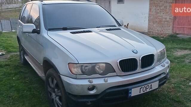 Серый БМВ Х5, объемом двигателя 3 л и пробегом 340 тыс. км за 5000 $, фото 1 на Automoto.ua