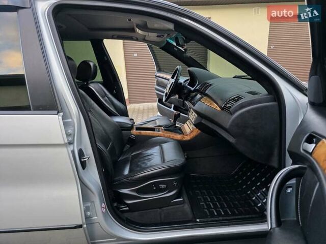 Серый БМВ Х5, объемом двигателя 3 л и пробегом 295 тыс. км за 7999 $, фото 87 на Automoto.ua