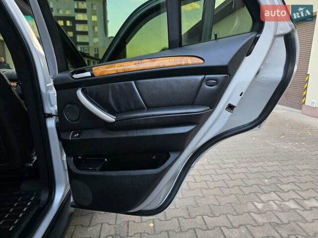 Серый БМВ Х5, объемом двигателя 3 л и пробегом 295 тыс. км за 7999 $, фото 114 на Automoto.ua