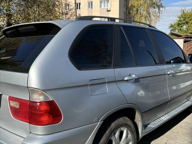 Серый БМВ Х5, объемом двигателя 3 л и пробегом 310 тыс. км за 8000 $, фото 3 на Automoto.ua