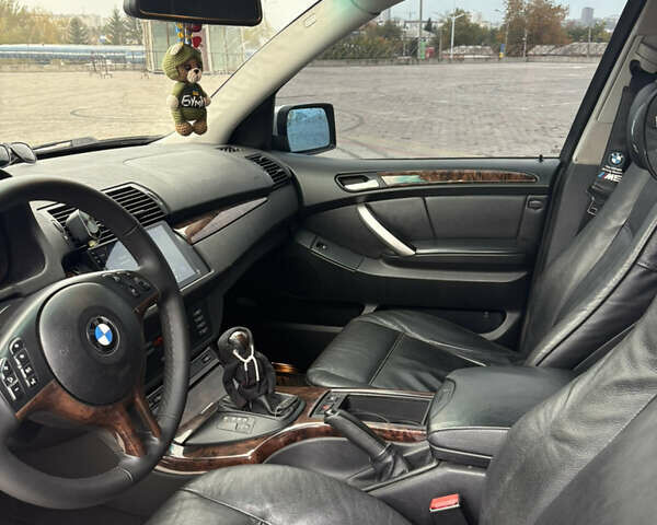 Серый БМВ Х5, объемом двигателя 3 л и пробегом 310 тыс. км за 8500 $, фото 11 на Automoto.ua