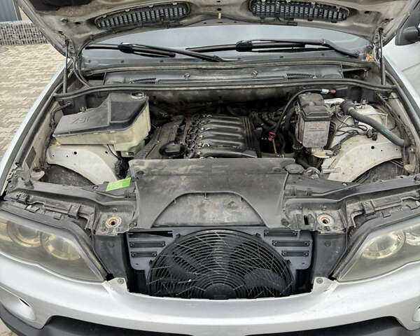 Серый БМВ Х5, объемом двигателя 3 л и пробегом 500 тыс. км за 9200 $, фото 8 на Automoto.ua