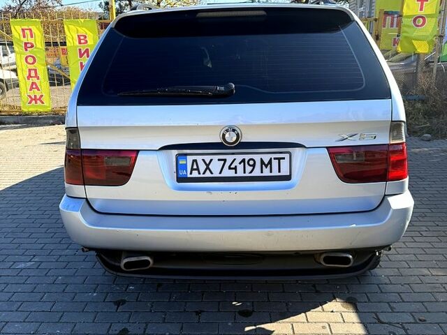 Серый БМВ Х5, объемом двигателя 3 л и пробегом 200 тыс. км за 8000 $, фото 3 на Automoto.ua