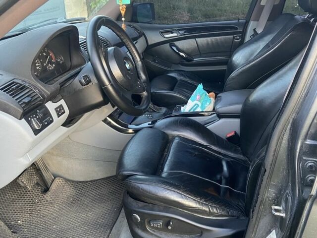 Серый БМВ Х5, объемом двигателя 3 л и пробегом 420 тыс. км за 9000 $, фото 3 на Automoto.ua