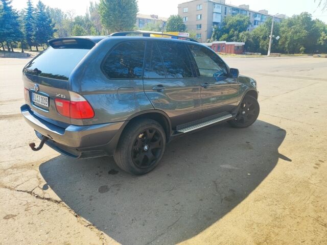 Серый БМВ Х5, объемом двигателя 3 л и пробегом 316 тыс. км за 5700 $, фото 3 на Automoto.ua