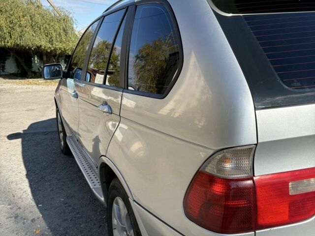 Серый БМВ Х5, объемом двигателя 3 л и пробегом 310 тыс. км за 8000 $, фото 4 на Automoto.ua