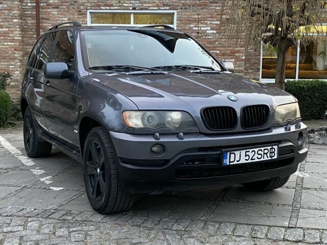 Серый БМВ Х5, объемом двигателя 3 л и пробегом 400 тыс. км за 4650 $, фото 6 на Automoto.ua