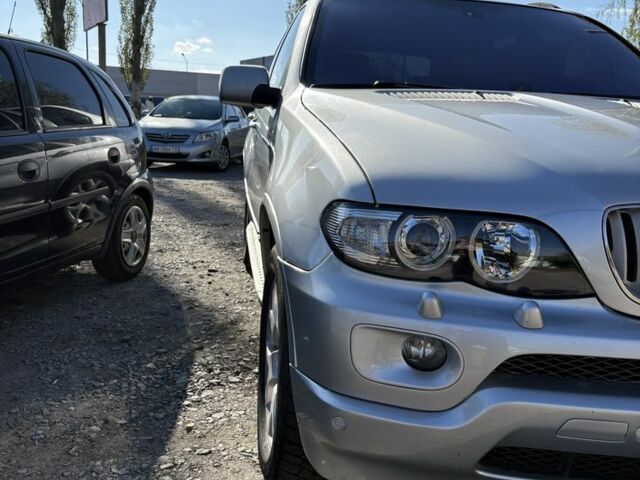 Серый БМВ Х5, объемом двигателя 3 л и пробегом 310 тыс. км за 8000 $, фото 1 на Automoto.ua