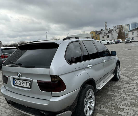 Серый БМВ Х5, объемом двигателя 3 л и пробегом 500 тыс. км за 9200 $, фото 4 на Automoto.ua