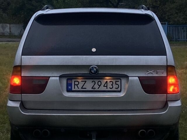 Серый БМВ Х5, объемом двигателя 3 л и пробегом 306 тыс. км за 5900 $, фото 2 на Automoto.ua