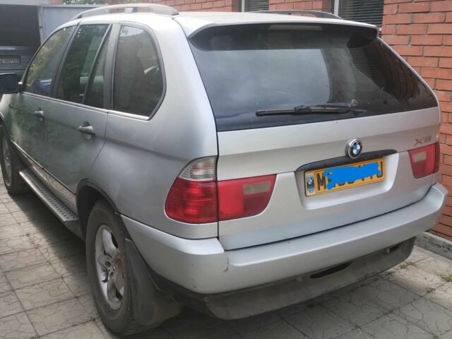 Серый БМВ Х5, объемом двигателя 3 л и пробегом 187 тыс. км за 4107 $, фото 1 на Automoto.ua