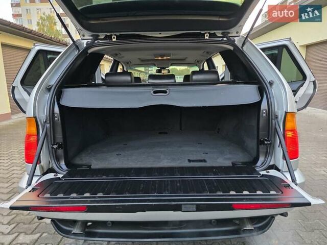 Серый БМВ Х5, объемом двигателя 3 л и пробегом 295 тыс. км за 7999 $, фото 122 на Automoto.ua