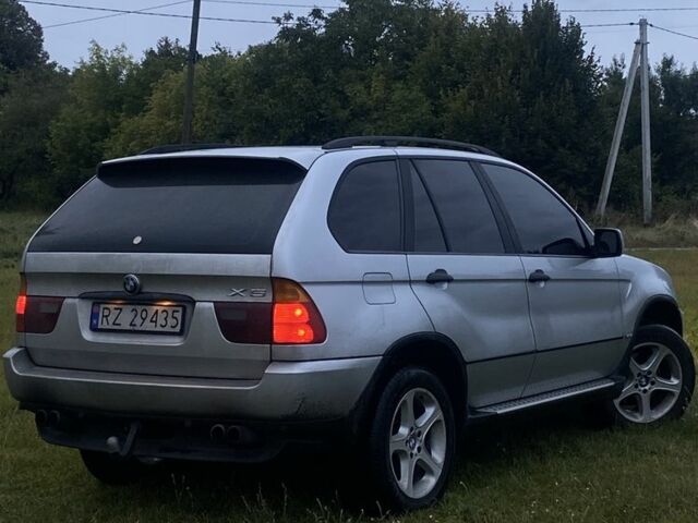 Серый БМВ Х5, объемом двигателя 3 л и пробегом 306 тыс. км за 5900 $, фото 1 на Automoto.ua