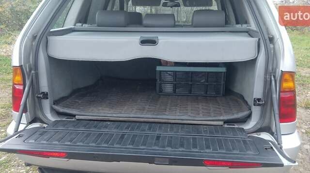 Серый БМВ Х5, объемом двигателя 2.99 л и пробегом 400 тыс. км за 9700 $, фото 4 на Automoto.ua