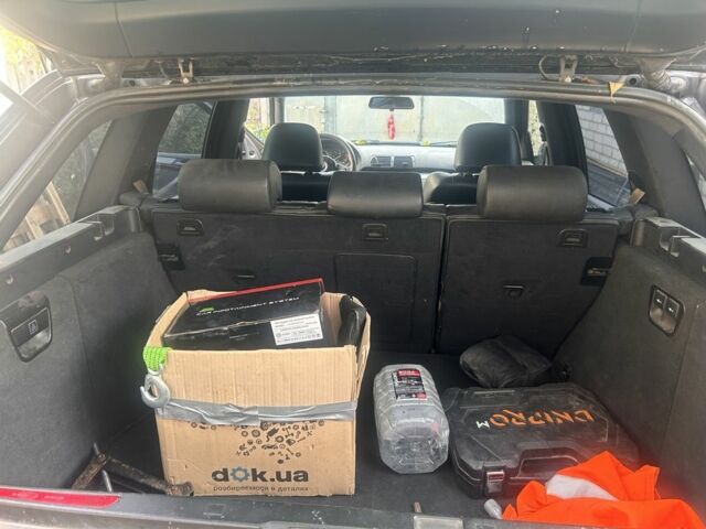 Серый БМВ Х5, объемом двигателя 3 л и пробегом 294 тыс. км за 6000 $, фото 6 на Automoto.ua