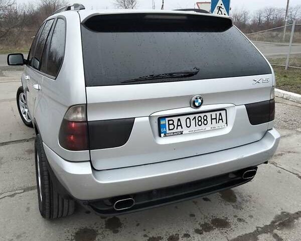 Серый БМВ Х5, объемом двигателя 3 л и пробегом 400 тыс. км за 9000 $, фото 5 на Automoto.ua