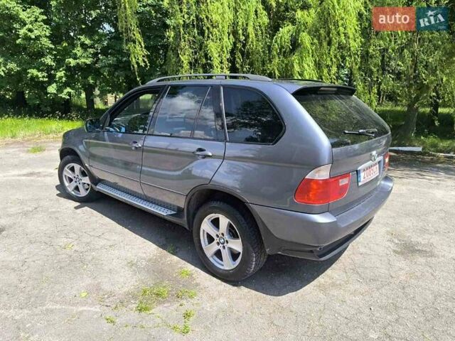 Серый БМВ Х5, объемом двигателя 3 л и пробегом 315 тыс. км за 6912 $, фото 10 на Automoto.ua