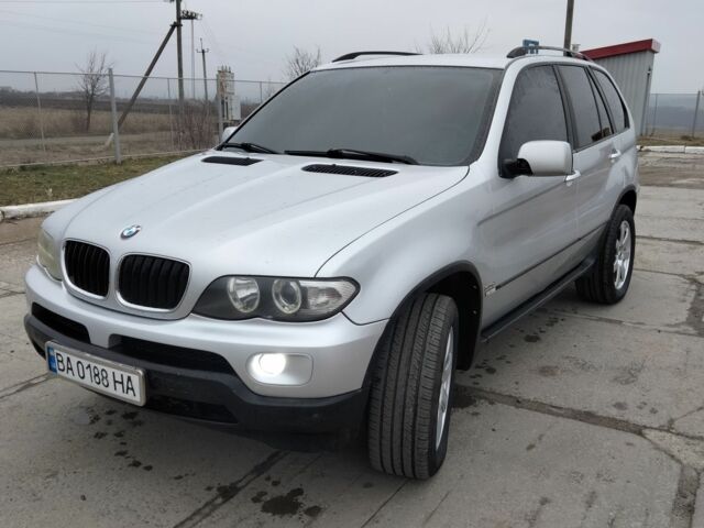 Серый БМВ Х5, объемом двигателя 3 л и пробегом 400 тыс. км за 9000 $, фото 1 на Automoto.ua