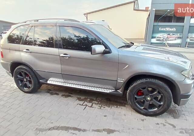 Сірий БМВ Х5, об'ємом двигуна 3 л та пробігом 260 тис. км за 12000 $, фото 29 на Automoto.ua