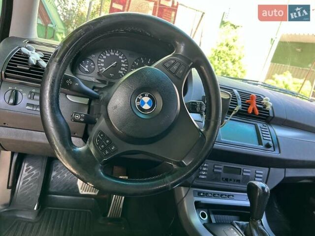 Сірий БМВ Х5, об'ємом двигуна 3 л та пробігом 310 тис. км за 10000 $, фото 5 на Automoto.ua