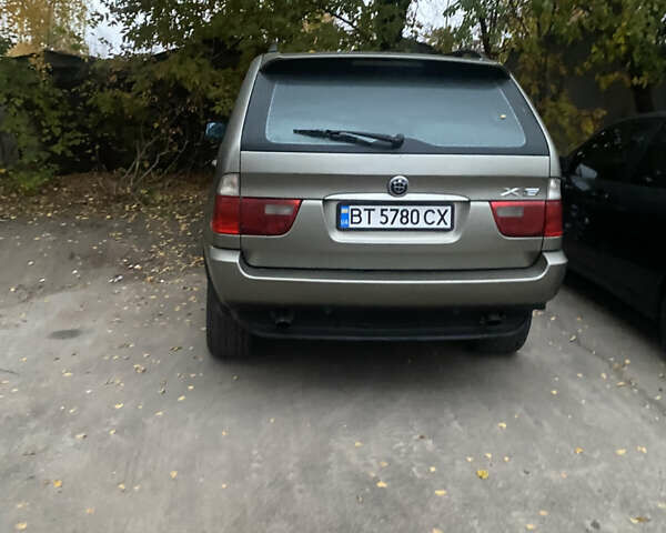 Серый БМВ Х5, объемом двигателя 3 л и пробегом 400 тыс. км за 8000 $, фото 4 на Automoto.ua