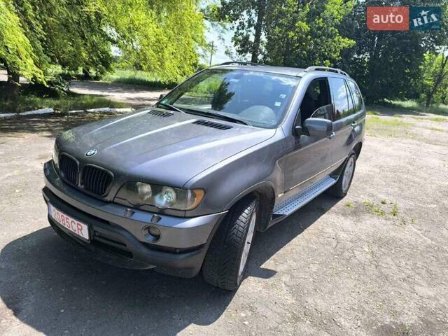 Серый БМВ Х5, объемом двигателя 3 л и пробегом 315 тыс. км за 6912 $, фото 4 на Automoto.ua
