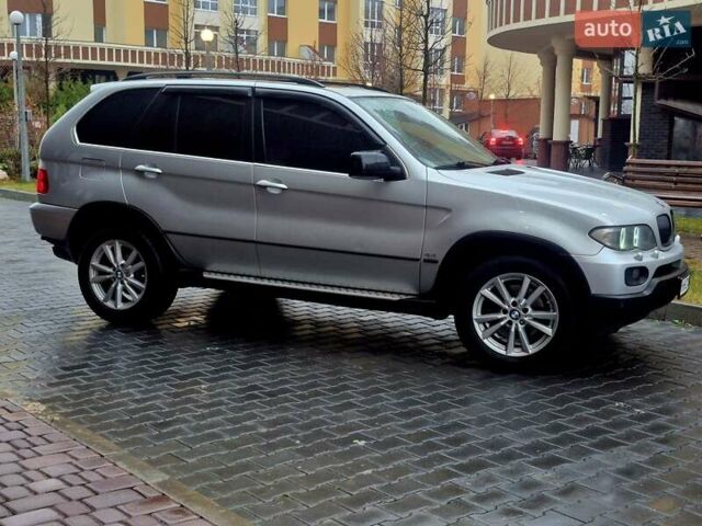 Серый БМВ Х5, объемом двигателя 4.4 л и пробегом 301 тыс. км за 9500 $, фото 7 на Automoto.ua