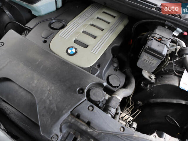 Серый БМВ Х5, объемом двигателя 3 л и пробегом 290 тыс. км за 16500 $, фото 70 на Automoto.ua