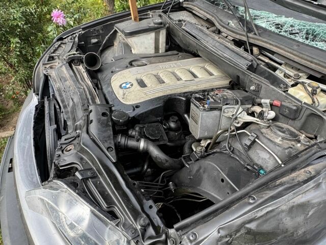 Серый БМВ Х5, объемом двигателя 3 л и пробегом 315 тыс. км за 6500 $, фото 4 на Automoto.ua