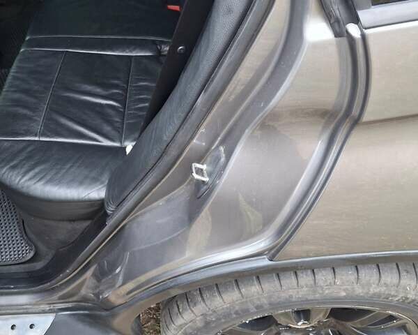 Серый БМВ Х5, объемом двигателя 3 л и пробегом 330 тыс. км за 11400 $, фото 10 на Automoto.ua