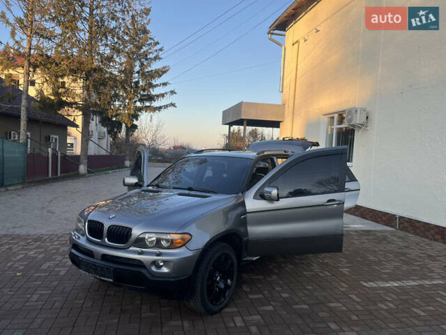 Сірий БМВ Х5, об'ємом двигуна 3 л та пробігом 293 тис. км за 11099 $, фото 22 на Automoto.ua
