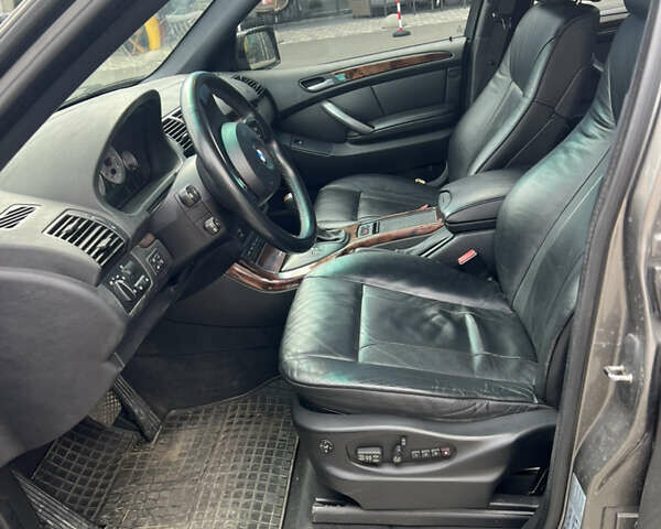 Серый БМВ Х5, объемом двигателя 4.8 л и пробегом 143 тыс. км за 18000 $, фото 8 на Automoto.ua