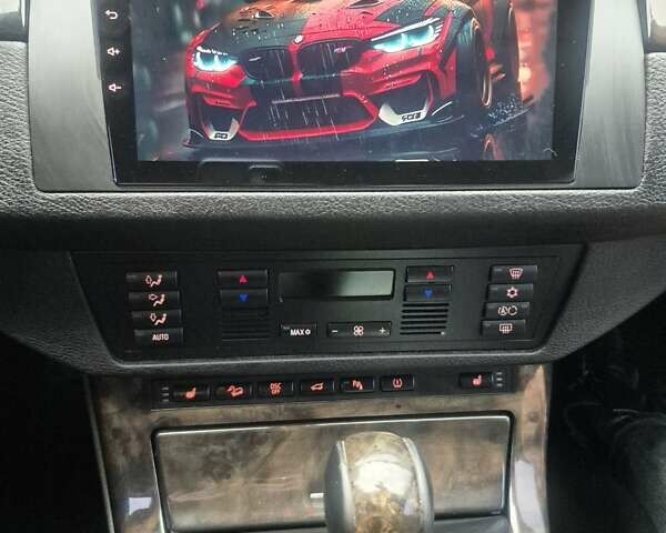 Серый БМВ Х5, объемом двигателя 4.4 л и пробегом 301 тыс. км за 9500 $, фото 29 на Automoto.ua