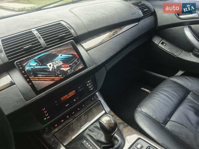 Серый БМВ Х5, объемом двигателя 4.4 л и пробегом 301 тыс. км за 9500 $, фото 27 на Automoto.ua