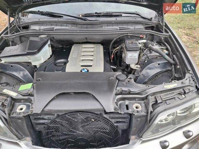 Серый БМВ Х5, объемом двигателя 3 л и пробегом 330 тыс. км за 11400 $, фото 11 на Automoto.ua