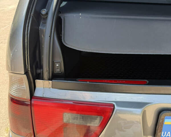 Серый БМВ Х5, объемом двигателя 3 л и пробегом 343 тыс. км за 13300 $, фото 3 на Automoto.ua