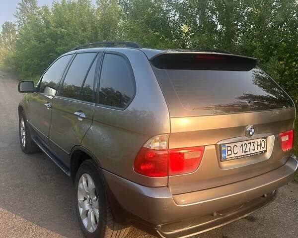 Серый БМВ Х5, объемом двигателя 3 л и пробегом 410 тыс. км за 11000 $, фото 4 на Automoto.ua