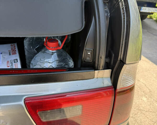 Серый БМВ Х5, объемом двигателя 3 л и пробегом 343 тыс. км за 13300 $, фото 4 на Automoto.ua