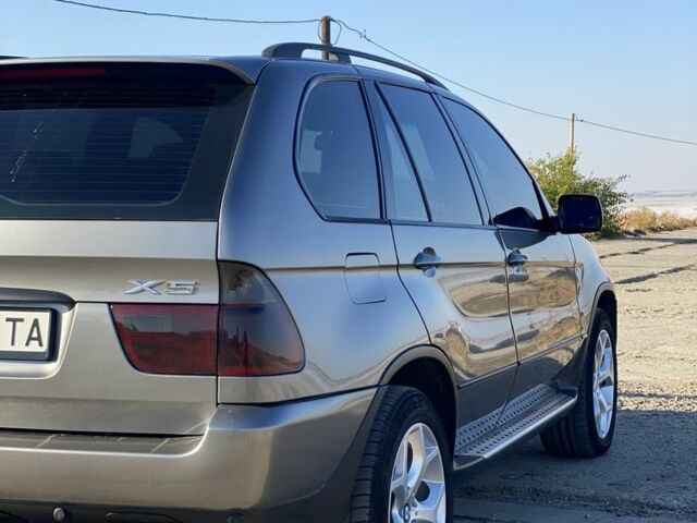 Сірий БМВ Х5, об'ємом двигуна 3 л та пробігом 297 тис. км за 11900 $, фото 1 на Automoto.ua