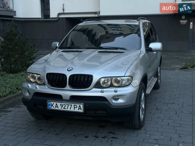 Серый БМВ Х5, объемом двигателя 3 л и пробегом 370 тыс. км за 10000 $, фото 4 на Automoto.ua