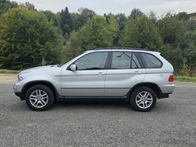 Серый БМВ Х5, объемом двигателя 3 л и пробегом 247 тыс. км за 4790 $, фото 2 на Automoto.ua