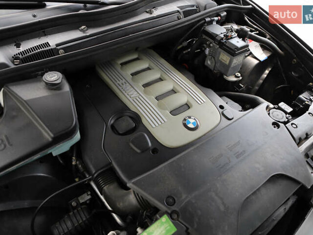 Серый БМВ Х5, объемом двигателя 3 л и пробегом 290 тыс. км за 16500 $, фото 69 на Automoto.ua