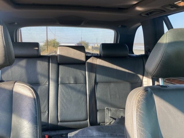 Сірий БМВ Х5, об'ємом двигуна 3 л та пробігом 297 тис. км за 11900 $, фото 4 на Automoto.ua